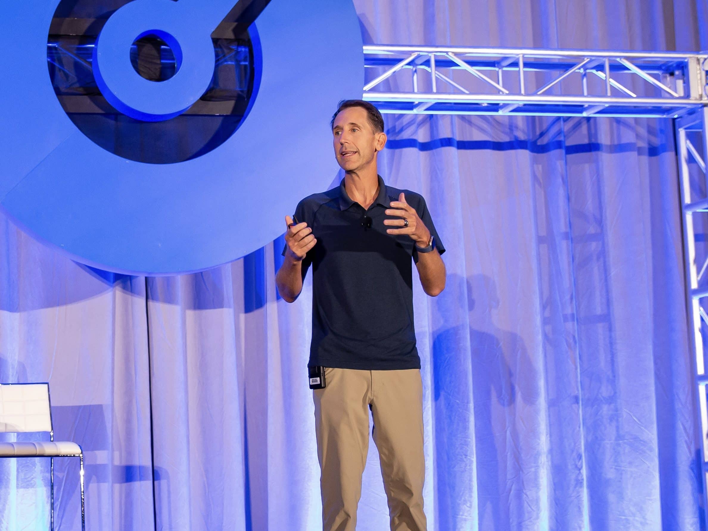 Steve Welch speaking on stage